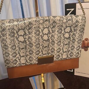 Vince Camuto Butterscotch Clutch with Elegant Design